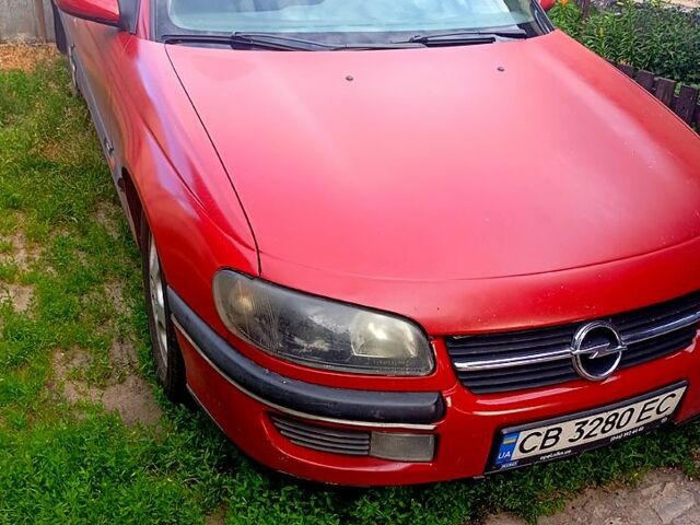 Червоний Опель Омега, об'ємом двигуна 2.5 л та пробігом 326 тис. км за 1650 $, фото 1 на Automoto.ua