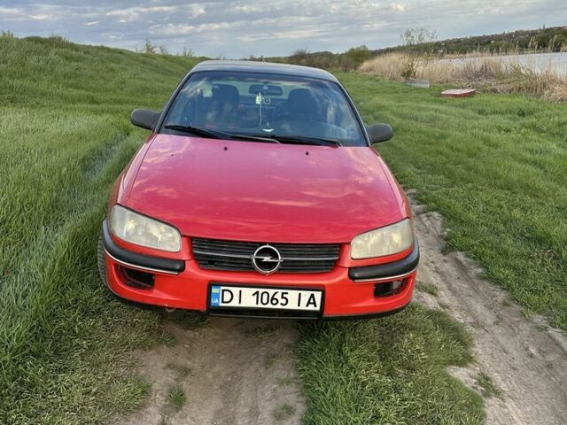 Червоний Опель Омега, об'ємом двигуна 2 л та пробігом 455 тис. км за 2500 $, фото 1 на Automoto.ua