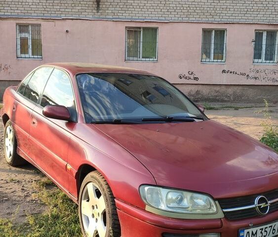 Червоний Опель Омега, об'ємом двигуна 3 л та пробігом 294 тис. км за 2400 $, фото 1 на Automoto.ua