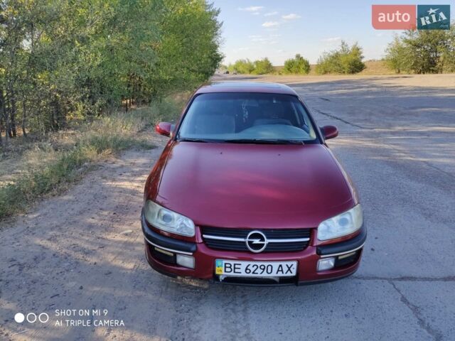 Красный Опель Омега, объемом двигателя 2 л и пробегом 485 тыс. км за 2300 $, фото 1 на Automoto.ua