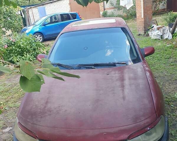 Красный Опель Омега, объемом двигателя 2 л и пробегом 190 тыс. км за 1200 $, фото 1 на Automoto.ua