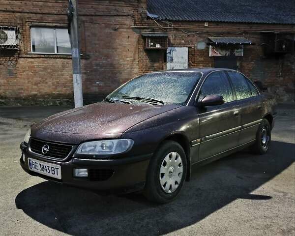 Опель Омега 1995 в Виннице на Automoto.ua Красный Опель Омега, объемом двигателя 2.5 л и пробегом 250 тыс. км за 1600 $, фото 1 на Automoto.ua