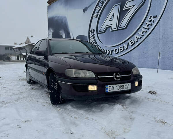 Червоний Опель Омега, об'ємом двигуна 2 л та пробігом 321 тис. км за 1999 $, фото 1 на Automoto.ua