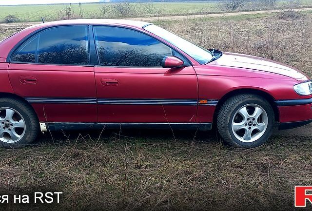 Красный Опель Омега, объемом двигателя 2 л и пробегом 300 тыс. км за 1500 $, фото 1 на Automoto.ua