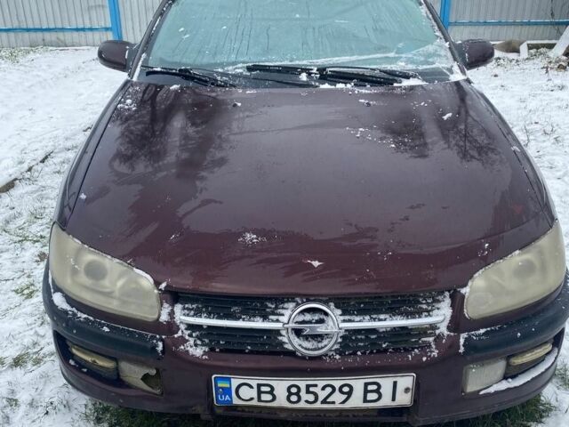 Червоний Опель Омега, об'ємом двигуна 2.5 л та пробігом 390 тис. км за 2000 $, фото 1 на Automoto.ua