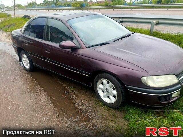 Червоний Опель Омега, об'ємом двигуна 2.5 л та пробігом 340 тис. км за 1800 $, фото 1 на Automoto.ua