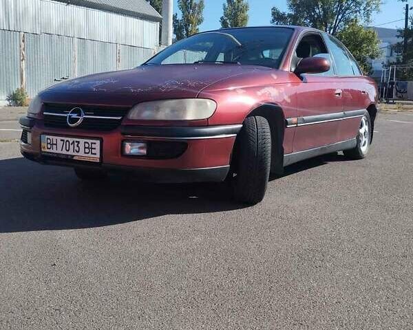Опель Омега 1996 в Одессе на Automoto.ua Красный Опель Омега, объемом двигателя 2.5 л и пробегом 316 тыс. км за 2500 $, фото 1 на Automoto.ua