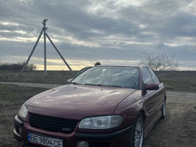 Червоний Опель Омега, об'ємом двигуна 3 л та пробігом 10 тис. км за 2600 $, фото 1 на Automoto.ua