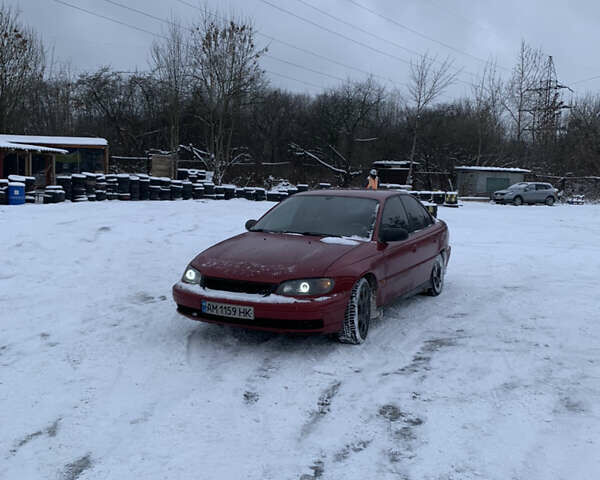 Красный Опель Омега, объемом двигателя 2.5 л и пробегом 380 тыс. км за 3400 $, фото 1 на Automoto.ua