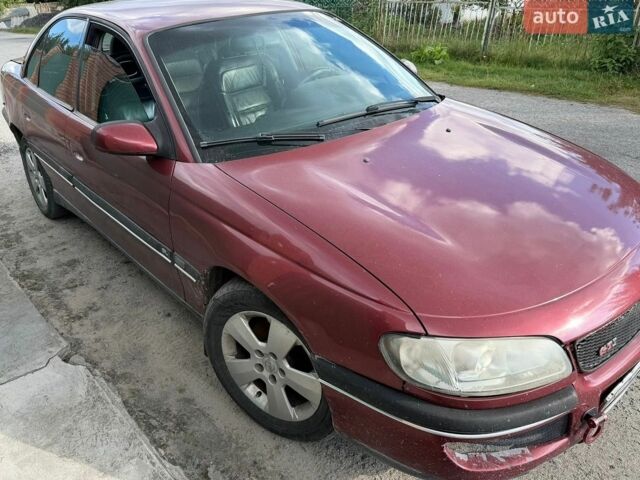 Червоний Опель Омега, об'ємом двигуна 2.5 л та пробігом 220 тис. км за 1500 $, фото 1 на Automoto.ua