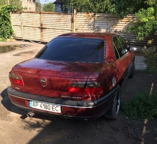 Червоний Опель Омега, об'ємом двигуна 2.5 л та пробігом 400 тис. км за 3800 $, фото 1 на Automoto.ua