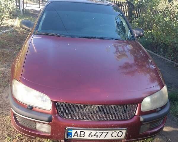 Красный Опель Омега, объемом двигателя 3 л и пробегом 350 тыс. км за 2200 $, фото 1 на Automoto.ua