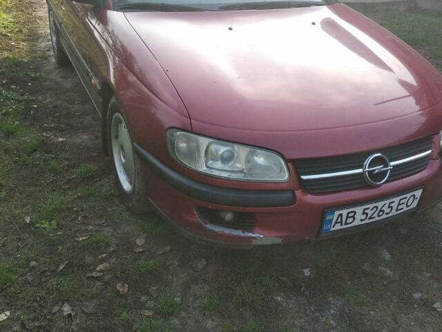 Червоний Опель Омега, об'ємом двигуна 2 л та пробігом 300 тис. км за 1700 $, фото 1 на Automoto.ua