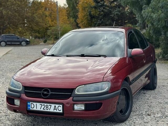 Красный Опель Омега, объемом двигателя 2.5 л и пробегом 390 тыс. км за 2600 $, фото 1 на Automoto.ua