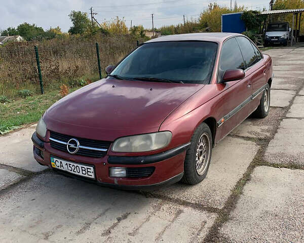 Червоний Опель Омега, об'ємом двигуна 2 л та пробігом 250 тис. км за 1500 $, фото 1 на Automoto.ua