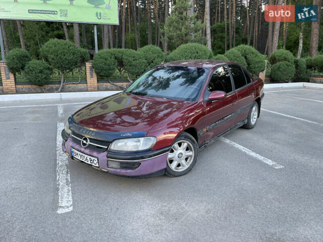 Червоний Опель Омега, об'ємом двигуна 2 л та пробігом 307 тис. км за 1500 $, фото 1 на Automoto.ua