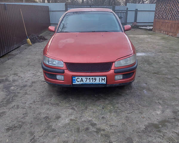Красный Опель Омега, объемом двигателя 2 л и пробегом 240 тыс. км за 1200 $, фото 1 на Automoto.ua