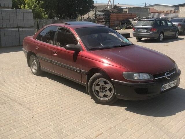 Червоний Опель Омега, об'ємом двигуна 2 л та пробігом 400 тис. км за 900 $, фото 1 на Automoto.ua