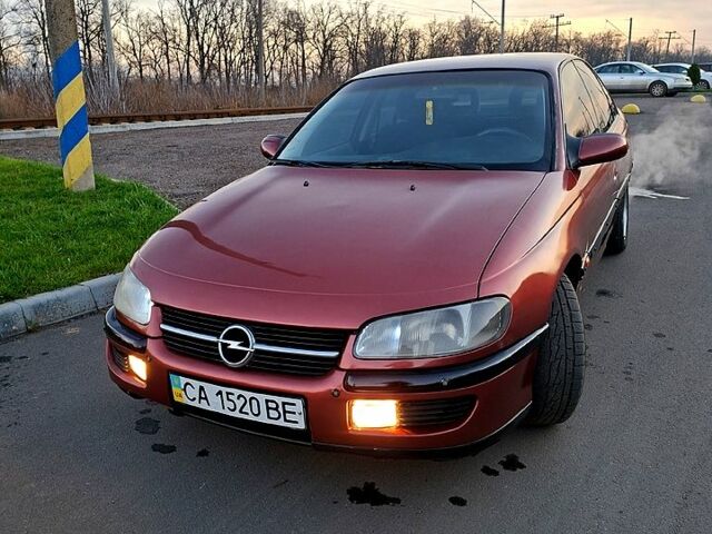 Красный Опель Омега, объемом двигателя 2 л и пробегом 400 тыс. км за 2690 $, фото 1 на Automoto.ua