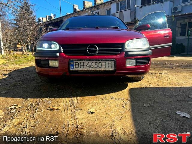 Красный Опель Омега, объемом двигателя 2.5 л и пробегом 381 тыс. км за 3200 $, фото 1 на Automoto.ua
