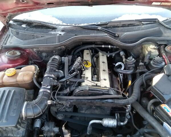 Красный Опель Омега, объемом двигателя 2 л и пробегом 100 тыс. км за 1350 $, фото 1 на Automoto.ua