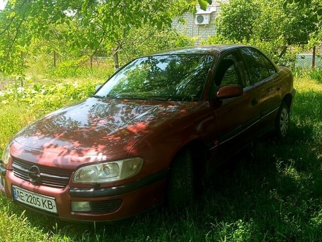 Красный Опель Омега, объемом двигателя 2 л и пробегом 450 тыс. км за 1350 $, фото 1 на Automoto.ua