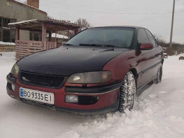 Красный Опель Омега, объемом двигателя 2.5 л и пробегом 460 тыс. км за 2500 $, фото 1 на Automoto.ua