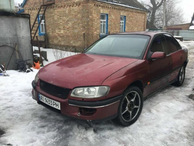 Червоний Опель Омега, об'ємом двигуна 3 л та пробігом 320 тис. км за 1300 $, фото 1 на Automoto.ua