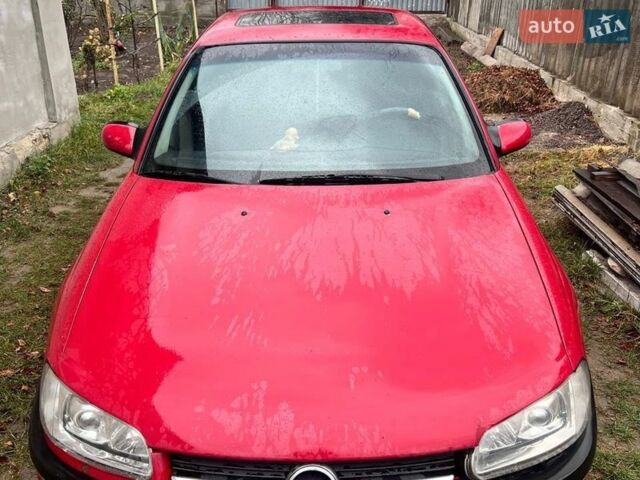 Червоний Опель Омега, об'ємом двигуна 2.2 л та пробігом 388 тис. км за 2199 $, фото 1 на Automoto.ua