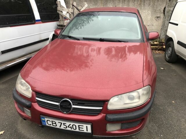 Красный Опель Омега, объемом двигателя 2 л и пробегом 430 тыс. км за 1045 $, фото 1 на Automoto.ua