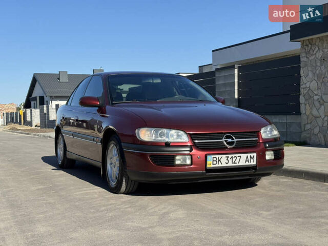 Красный Опель Омега, объемом двигателя 2 л и пробегом 298 тыс. км за 3500 $, фото 1 на Automoto.ua