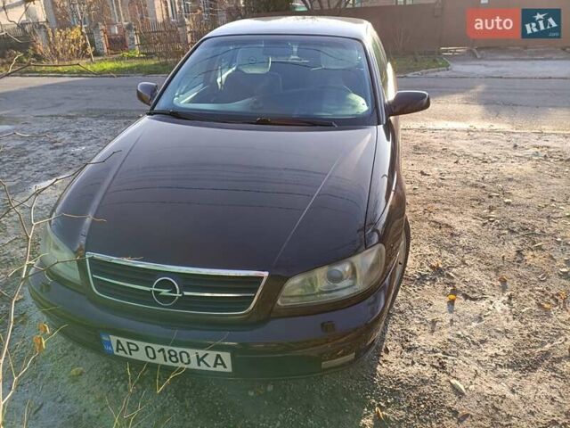 Красный Опель Омега, объемом двигателя 2.2 л и пробегом 222 тыс. км за 3500 $, фото 1 на Automoto.ua