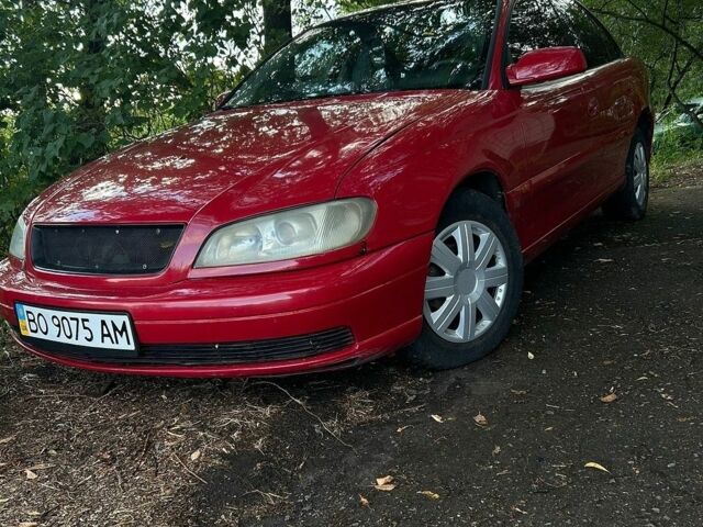 Червоний Опель Омега, об'ємом двигуна 2.2 л та пробігом 230 тис. км за 2000 $, фото 1 на Automoto.ua