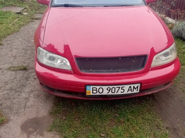 Красный Опель Омега, объемом двигателя 2.2 л и пробегом 160 тыс. км за 2200 $, фото 1 на Automoto.ua