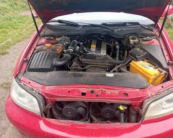 Червоний Опель Омега, об'ємом двигуна 2.2 л та пробігом 288 тис. км за 2300 $, фото 1 на Automoto.ua