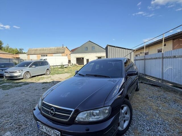 Красный Опель Омега, объемом двигателя 2.2 л и пробегом 222 тыс. км за 2550 $, фото 1 на Automoto.ua
