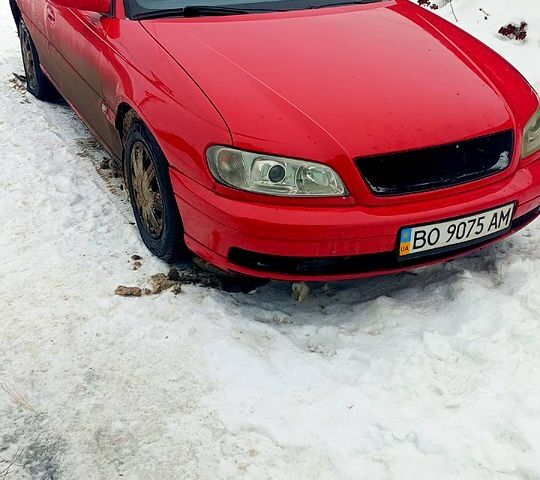 Красный Опель Омега, объемом двигателя 2.2 л и пробегом 250 тыс. км за 2300 $, фото 1 на Automoto.ua