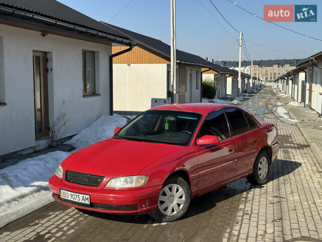 Красный Опель Омега, объемом двигателя 2.2 л и пробегом 290 тыс. км за 1850 $, фото 1 на Automoto.ua
