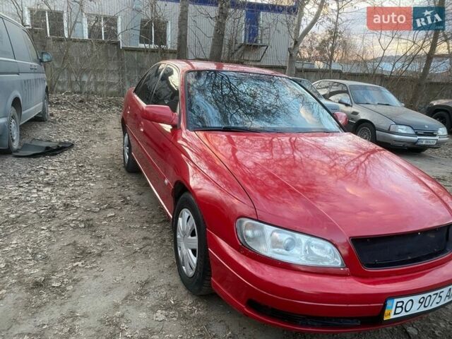 Красный Опель Омега, объемом двигателя 2.2 л и пробегом 320 тыс. км за 2400 $, фото 1 на Automoto.ua