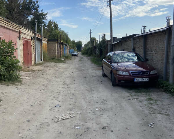 Червоний Опель Омега, об'ємом двигуна 2.6 л та пробігом 336 тис. км за 2000 $, фото 1 на Automoto.ua