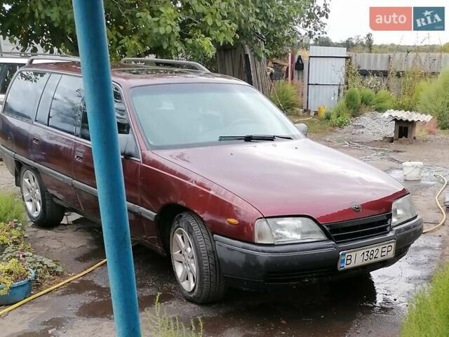Красный Опель Омега, объемом двигателя 2.26 л и пробегом 150 тыс. км за 1400 $, фото 1 на Automoto.ua