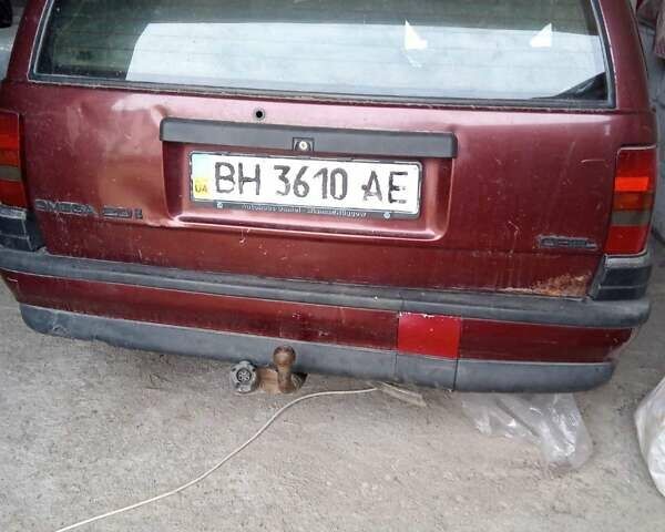 Червоний Опель Омега, об'ємом двигуна 2 л та пробігом 222 тис. км за 1800 $, фото 1 на Automoto.ua