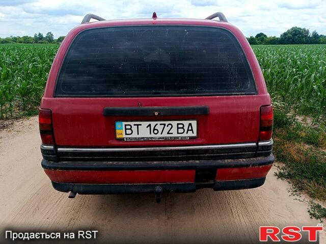 Красный Опель Омега, объемом двигателя 2 л и пробегом 300 тыс. км за 600 $, фото 1 на Automoto.ua