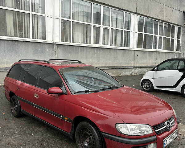 Червоний Опель Омега, об'ємом двигуна 2 л та пробігом 401 тис. км за 950 $, фото 1 на Automoto.ua
