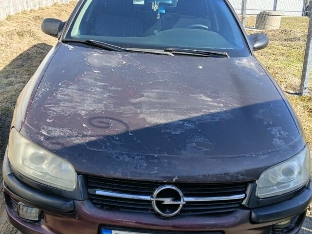 Красный Опель Омега, объемом двигателя 2 л и пробегом 379 тыс. км за 1500 $, фото 1 на Automoto.ua