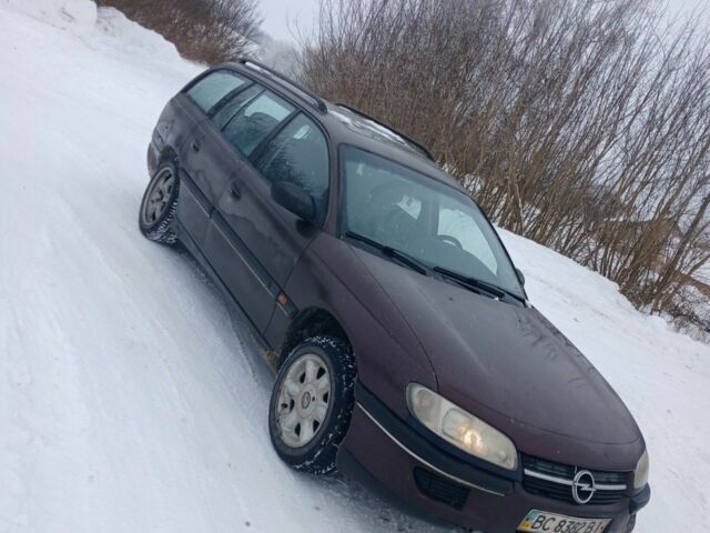 Красный Опель Омега, объемом двигателя 2 л и пробегом 310 тыс. км за 1300 $, фото 1 на Automoto.ua