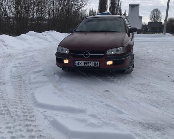 Червоний Опель Омега, об'ємом двигуна 2.5 л та пробігом 200 тис. км за 1700 $, фото 1 на Automoto.ua