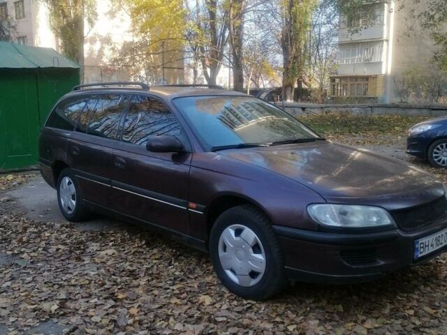 Червоний Опель Омега, об'ємом двигуна 2 л та пробігом 298 тис. км за 2500 $, фото 1 на Automoto.ua