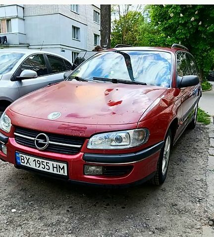 Червоний Опель Омега, об'ємом двигуна 2.5 л та пробігом 140 тис. км за 1750 $, фото 1 на Automoto.ua