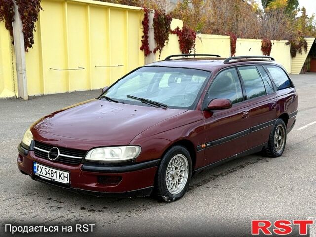 Красный Опель Омега, объемом двигателя 2 л и пробегом 250 тыс. км за 1500 $, фото 1 на Automoto.ua